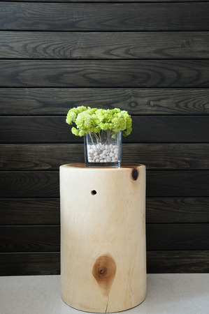 Green flower in vase with wall background.の写真素材