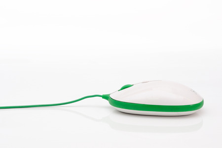 Computer mouse with green cable. Business concept.