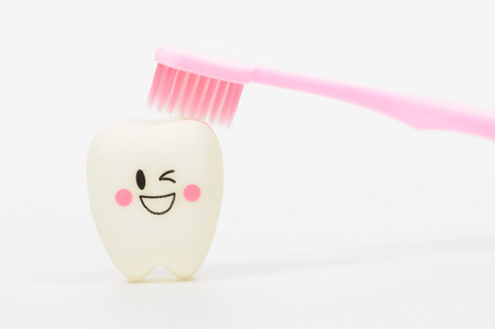 Pink toothbrush bushing smile teeth, Healthcare conceptの写真素材