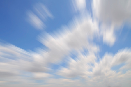 Blue sky with light clouds, motion