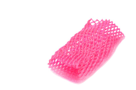 Pink Foam net on white backgroundの写真素材
