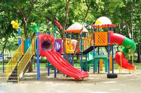 Colorful playground equipment for children in public park.