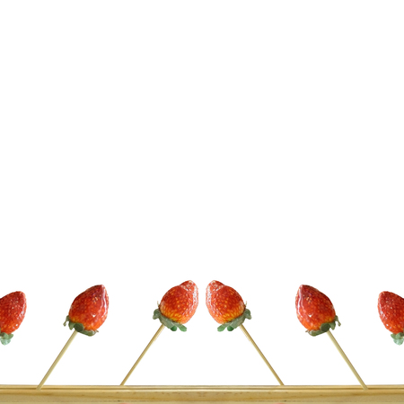 Strawberry skewer on white background.の写真素材
