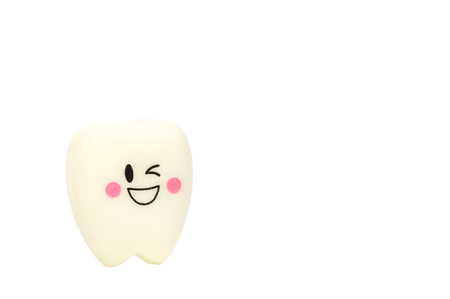 Children toy smile rubber teeth on white background.の写真素材