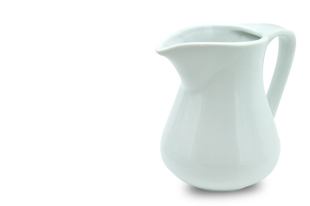 Cream and milk ceramic jug on white background.の写真素材