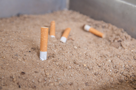 Cigarettes butt on sand tray, World No Tobacco Day 31 Maysの写真素材