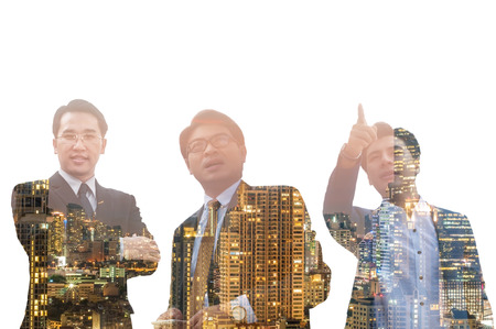 Confidence middle Asian business men standing arms crossed and looking to the sky.の写真素材
