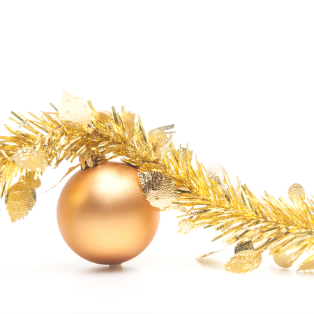 Golden Christmas ball and ribbon decoration for Christmas and New Year festival.の写真素材