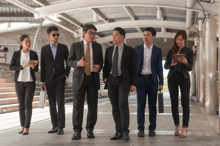 Asian business people and team discussion and planning business financial strategy project.の写真素材