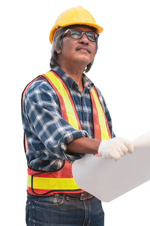Senior Asian civil engineer wearing security jacket and safety helmet holding blueprint to check proceed of construction project isolated on white background.の写真素材
