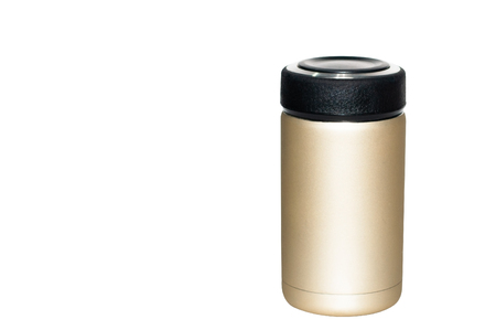 Clipping path, golden coffee tumbler with black cover keep beverage thermo hot and cold.  Stainless vacuum container fot takeaway reduce plastic glass. Global warming save the world conception.の写真素材