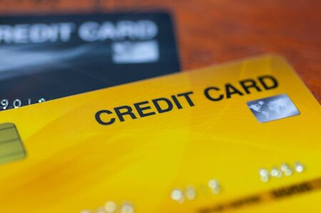 Credit cards on table.  Business techology do moneyless transaction by plastic cards for buy sell offline and online shopping.の写真素材