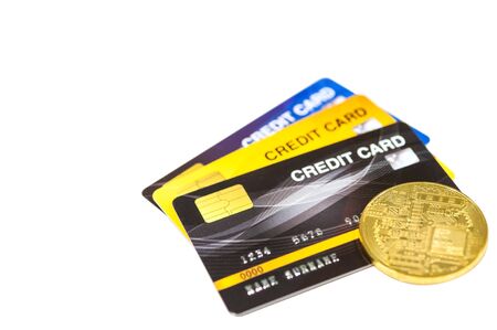 Credit cards and gold bitcoin cryptocurrency blockchain for payment the debt banking fee, money less make cash flow, new money monetary value.の写真素材