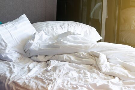 Bed in the morning is very messy.の写真素材