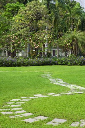 Walkway pathway curve in public garden, Bangkok Thailand.の写真素材