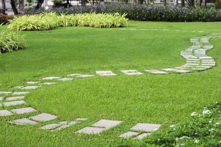 Walkway pathway curve in public garden, Bangkok Thailand.の写真素材