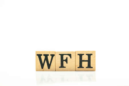 Cube wooden block alphabet, work from home.の写真素材