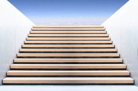 Stairs leading up to blue sky, challenge business concept.の写真素材