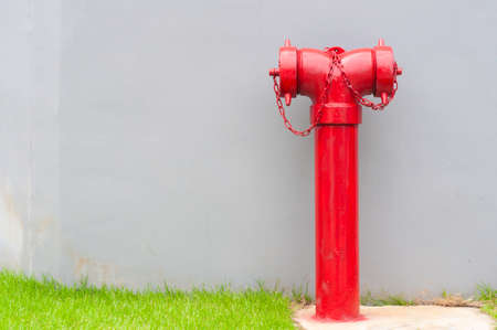 Single red fire hydrant stand on outdoor for preventive fire,