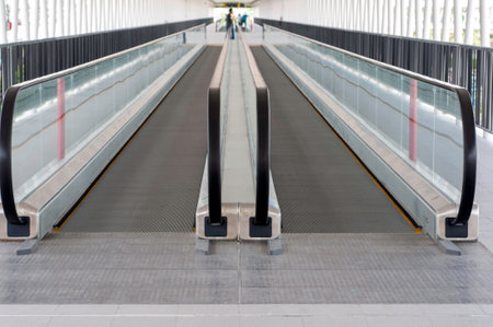 Moving escalator walkway in airport,の写真素材