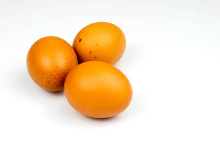 Three eggs on white backgroundの写真素材