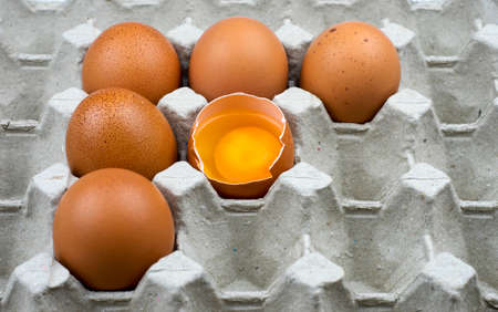 Six eggs in paper trayの写真素材