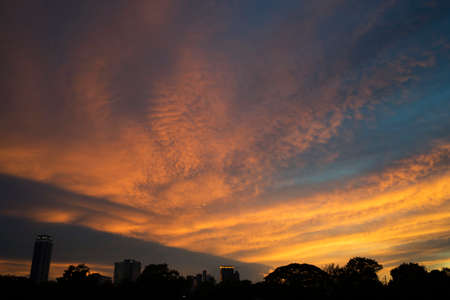 Beautiful twilight sky and sihouette town on bottom of frameの写真素材