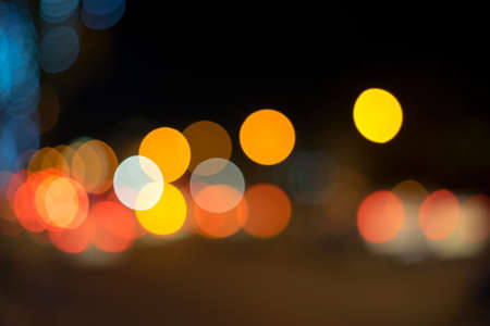 Out focus and blur of light under the tree at night timeの写真素材