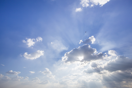 Skies and clouds with sunbeamsの写真素材