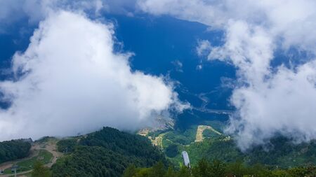 view of the city from the top of the cable car. Panorama from the mountains. Mountain view....
