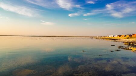combination of Sunset and Beach. colorful orange sunset at the beach.の写真素材