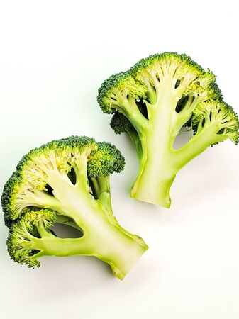 broccoli vegetables isolated on white background. broccoli cut in half.の写真素材