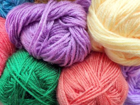 Many multi-colored skeins close-up. multicolored skeins for knittingの写真素材