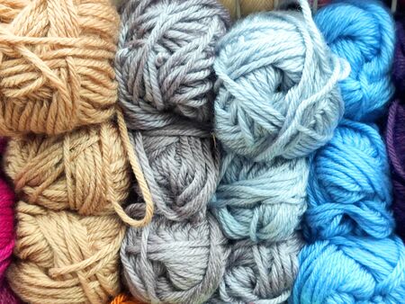 Large amount of colored yarn for knitting.