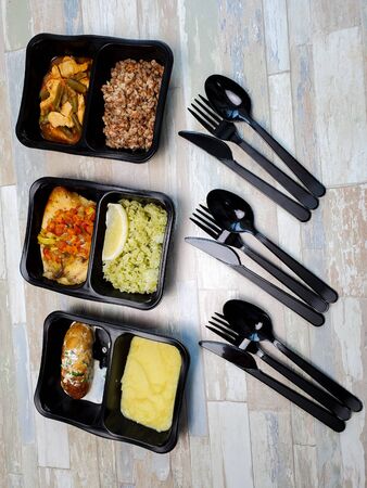 Useful food in disposable containers. Concept: proper nutrition, food delivery.の写真素材