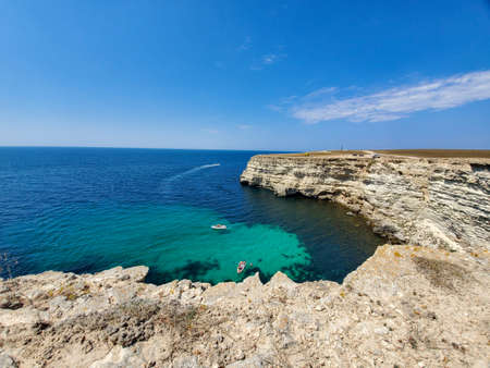 Water excursions on the sea by motor boats. Motor boats sail on the sea. Motor boats at sea on a Sunny day. Happy holidays at the sea.の写真素材