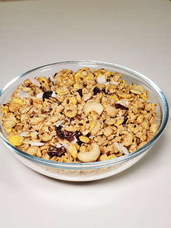 Bowl of muesli for breakfast close-up, white background. Healthy Breakfast Concept