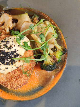 delicious dish with cutlets and pumpkin puree on a plate, a dish to serve in a restaurant. close-upの写真素材
