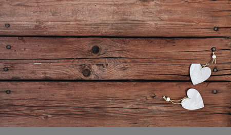 wooden hearts on a wooden background. Valentine's day.の写真素材