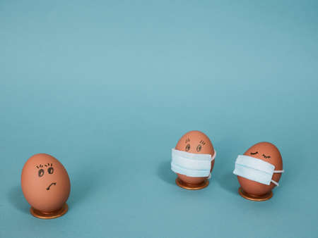 Easter eggs and remedies for the virus. DIY masked Easter eggs to decorate your Easter holidays. Copy space.の写真素材
