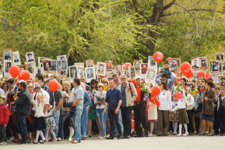 Akhtubinsk, Astrakhan region / RUSSIA- May 9, 2017: The Immortal Regiment on Victory Day (May 9), when people march in a column and carry banners with portraits of their relatives who participated in the Great Patriotic War.のeditorial素材