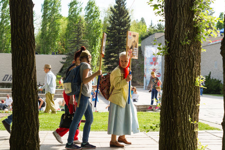 Volgograd, Russia - May 9, 2018: Procession of local residents with photographs of their relatives...
