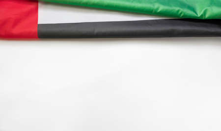 December 2 - Independence Day of the United Arab Emirates. UAE flag on a white background with space for text at the bottomの写真素材