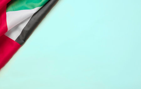 Happy Holidays. Female hands untie a bow on a gift box for Christmas in a white bedの写真素材