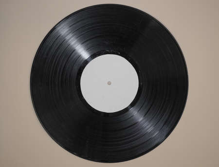 vinyl record on beige background.の写真素材