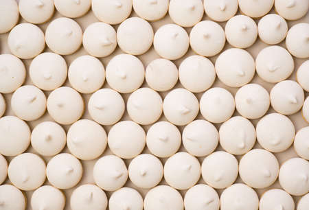 Background of sugar cookies in white glaze, close-up view, shot from above.の写真素材