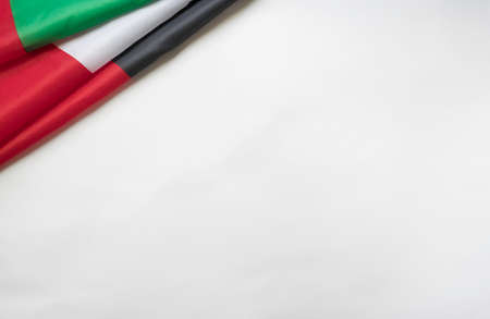 December 2 - Independence Day of the United Arab Emirates. UAE flag on a white background with space for text at the bottomの写真素材