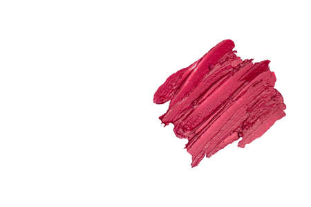 Smear of red, scarlet, lipstick on a white background.の写真素材