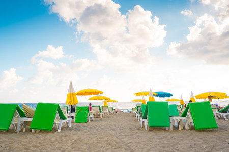 Alanya, Turkey - August 29, 2022: People relax on the sandy beach in Alanya, Turkey.のeditorial素材