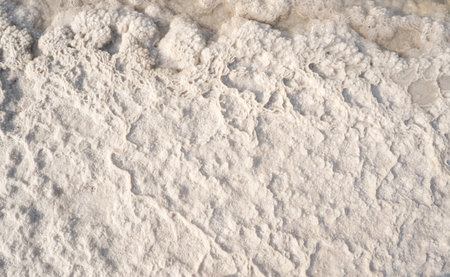 Natural Salt Crust Surface Pattern On Salty Lake Texture With Mineral Deposits And Shallow Water...